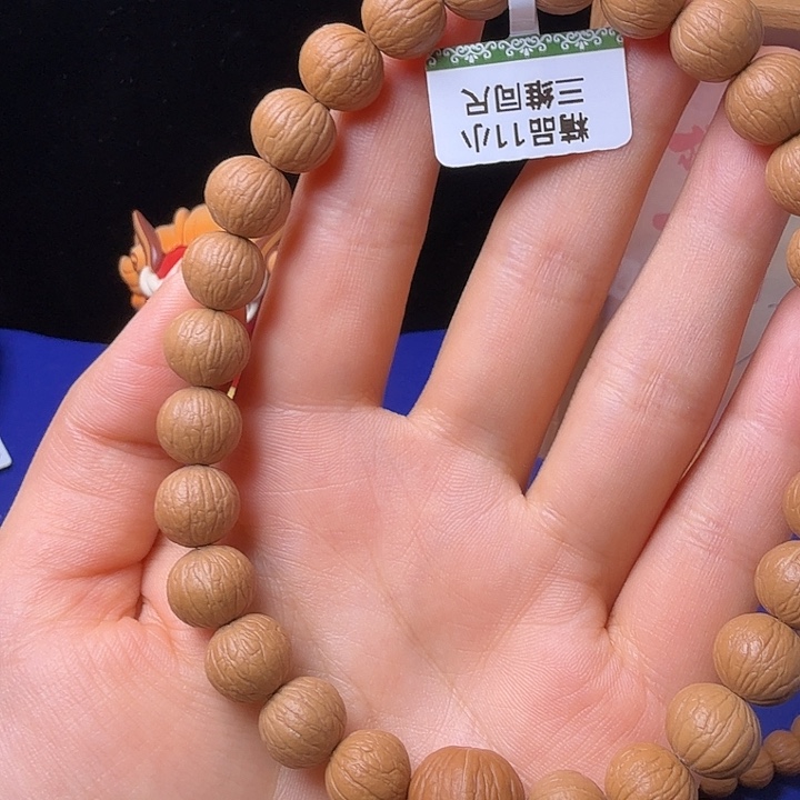 小***贝猴头核桃吊坠凤羽