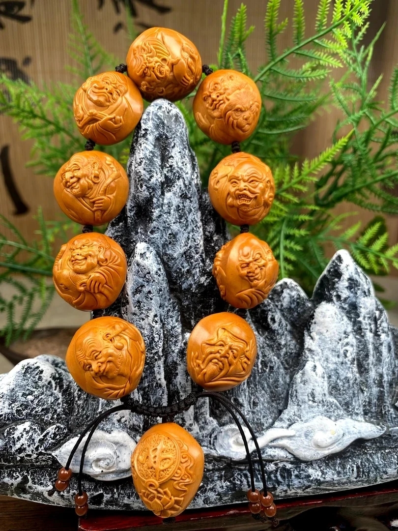 2.2双面十八罗汉脖挂橄榄核雕手串