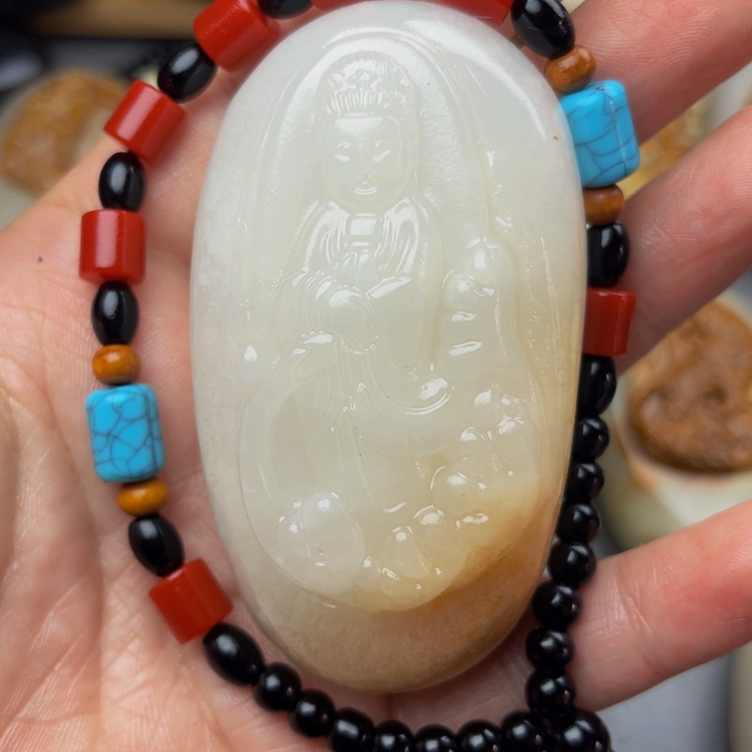 石材方解石手把件观音