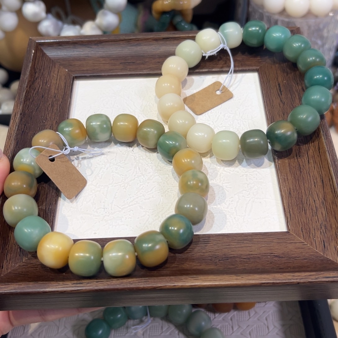 吊坠菩提根/象牙果棕青羽卡14微瑕