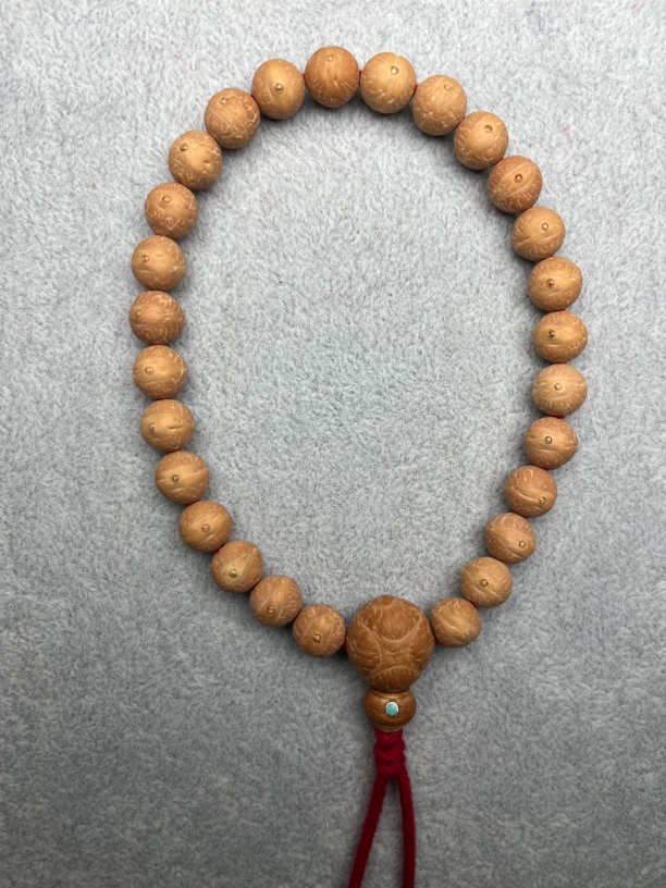 尼泊尔凤眼菩提11mm27颗手持