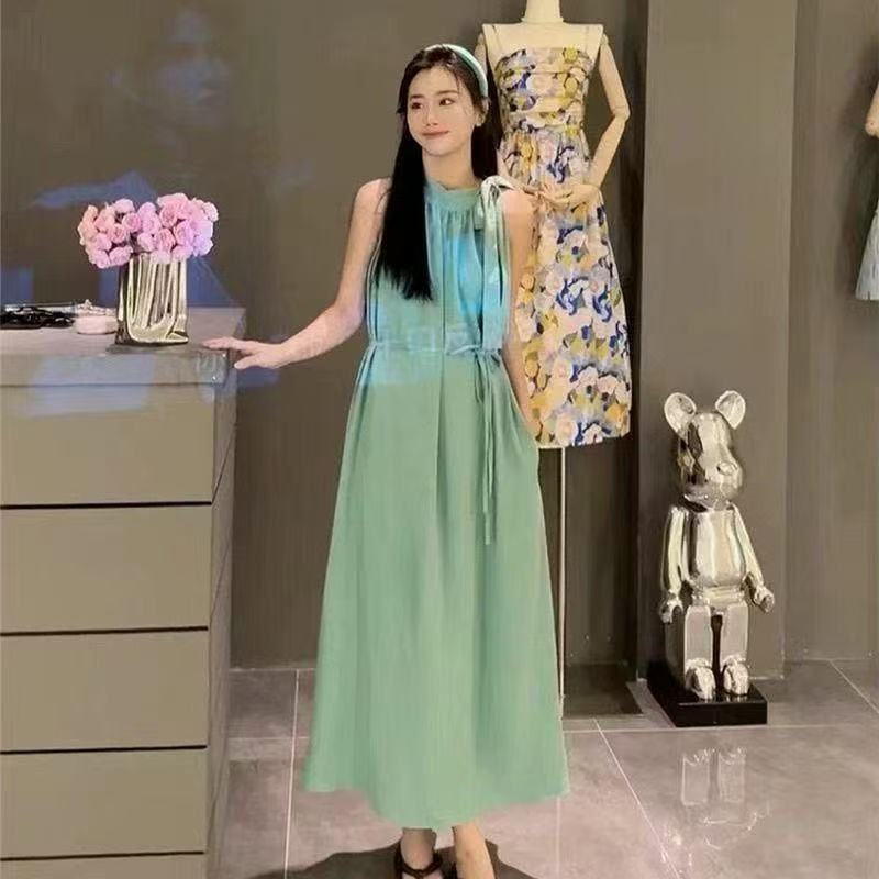 法式气质高级感挂脖吊带连衣裙女夏季新款休闲宽松度假A字长裙子