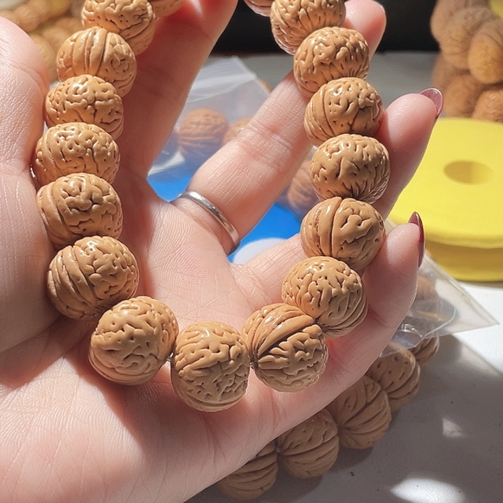 起***意桃核吊坠桃核手串金鱼肚51