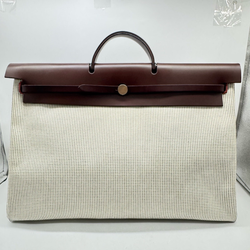 99新 Hermes/爱马仕 波尔多酒红色帆布herbag50手提包 尺寸50/34 