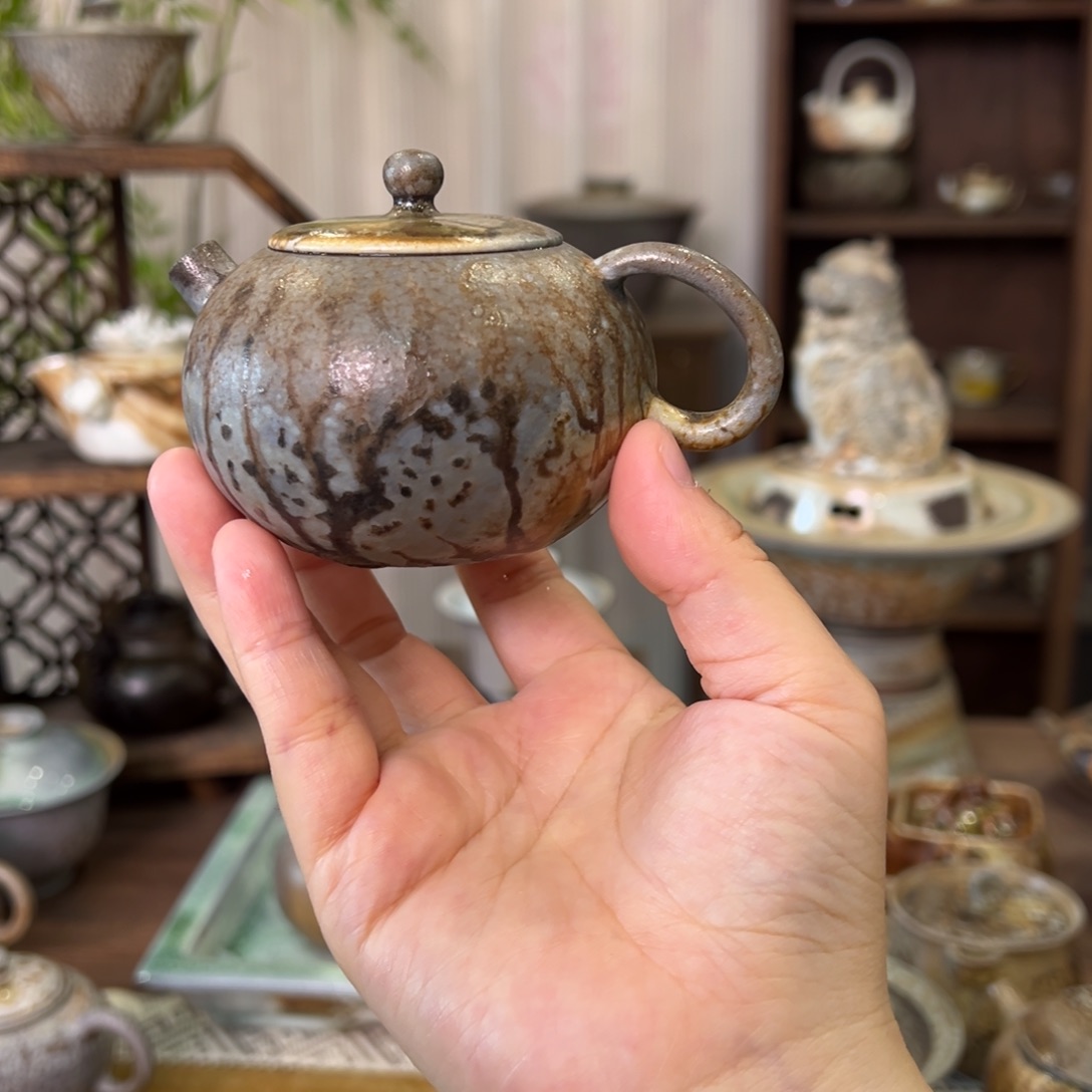 14中白重落灰西施壶