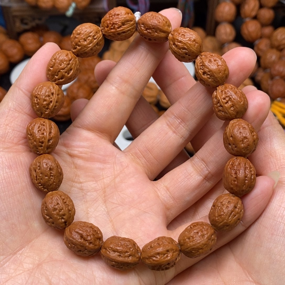 桃核手串打**间小八棱，