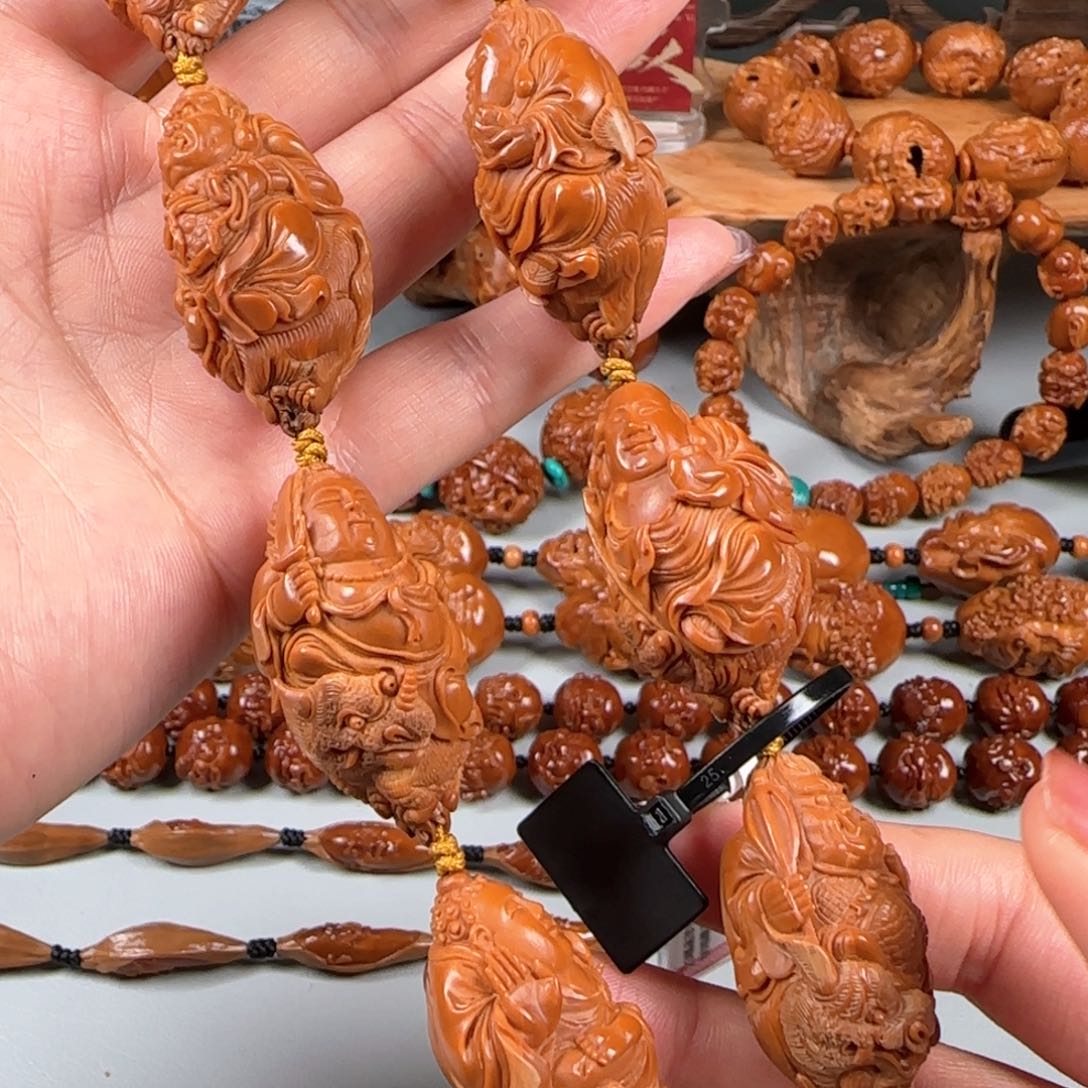 橄榄核手串/手链宽2.3鸡血红水晶核立雕瑞兽万佛朝宗