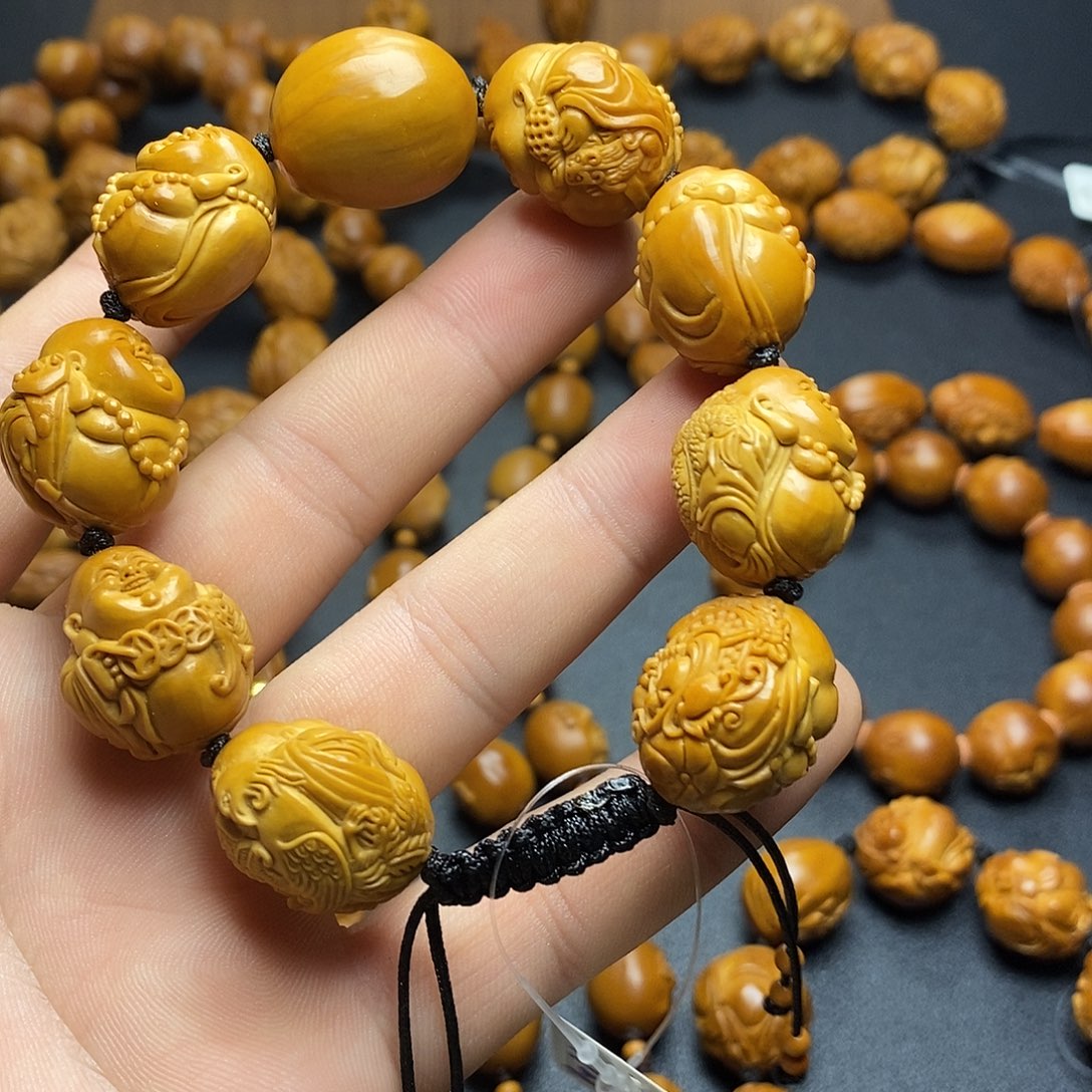 亮***了橄榄核手串/手链瑞兽弥勒