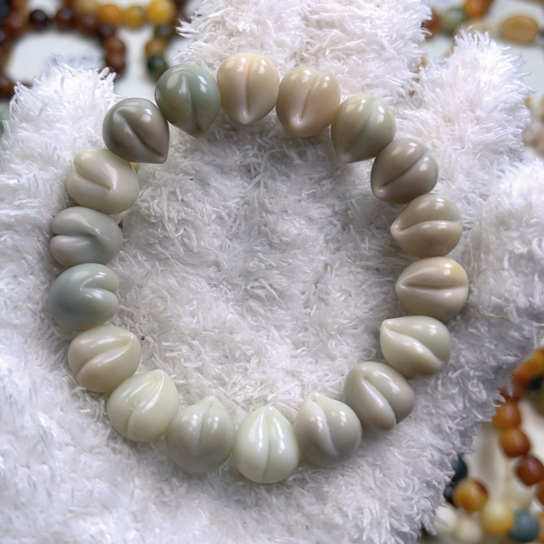 菩提根/象牙果手串奶蓝桃子