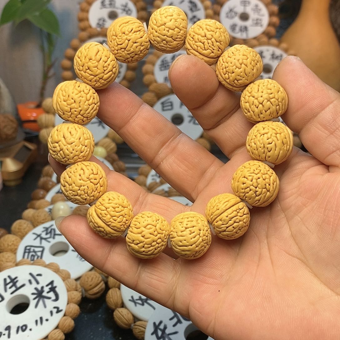 【闪购商品】?****?桃核手串虎皮肌肉