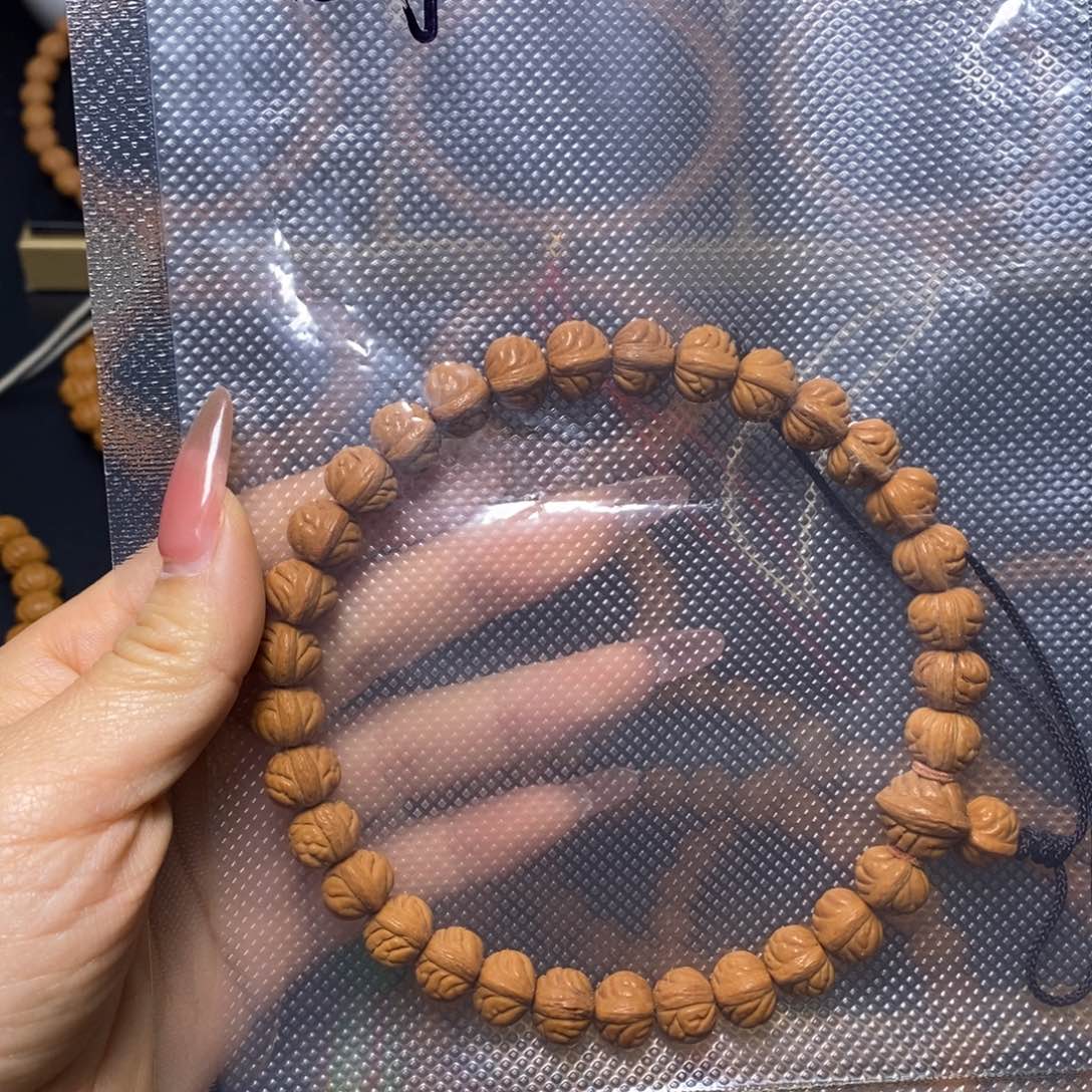 晴***_吊坠桃核秦岭文玩