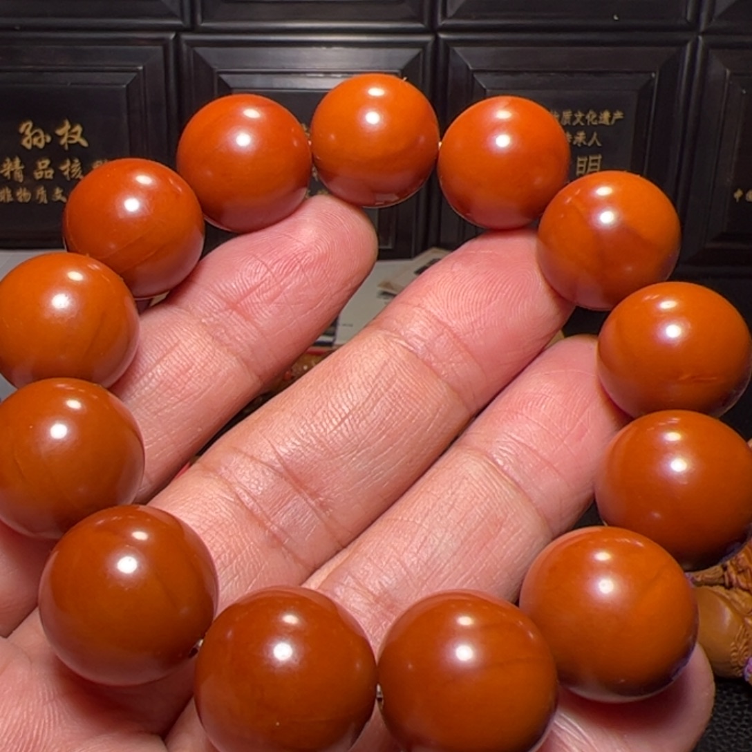 忙***李橄榄核手串正圆手串
