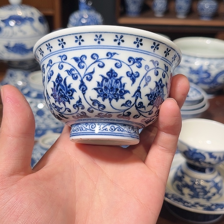 瓷片永乐青花压手杯花心款