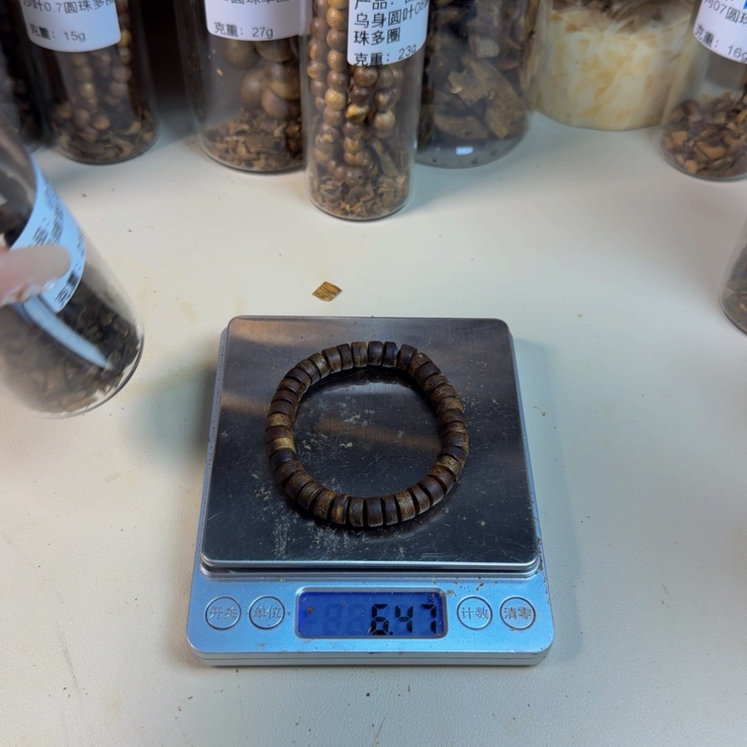 沉香沉香碎屑乌身圆叶单圈片珠6g
