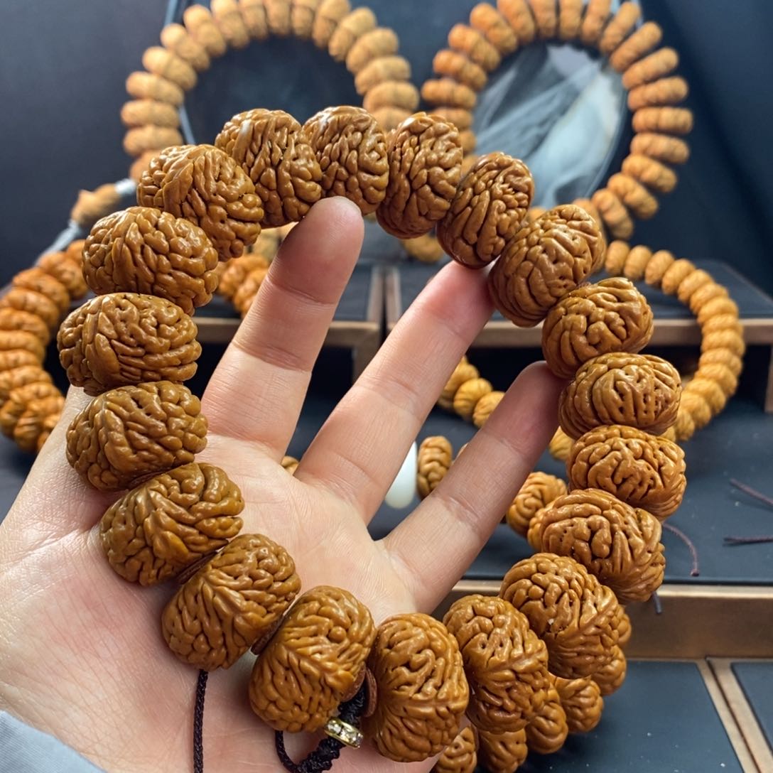 桃核手串龙纹桃核麒麟