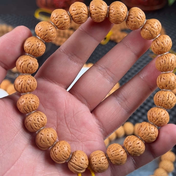 阿****手串桃核野生刀脐