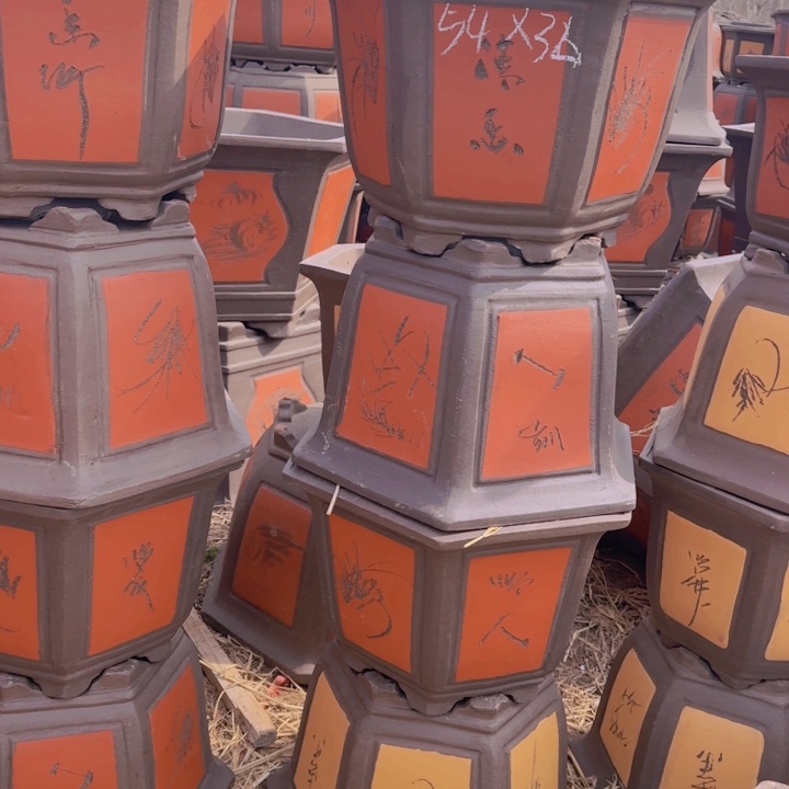 红陶口径54高36……………………