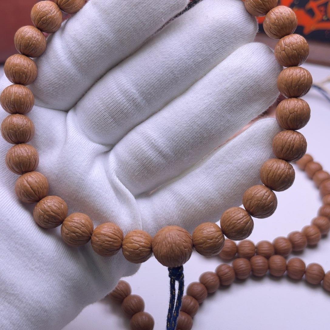 向***走猴头核桃吊坠12.8凤羽