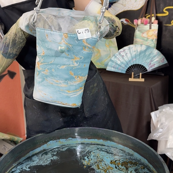 779落花流水水桶包包