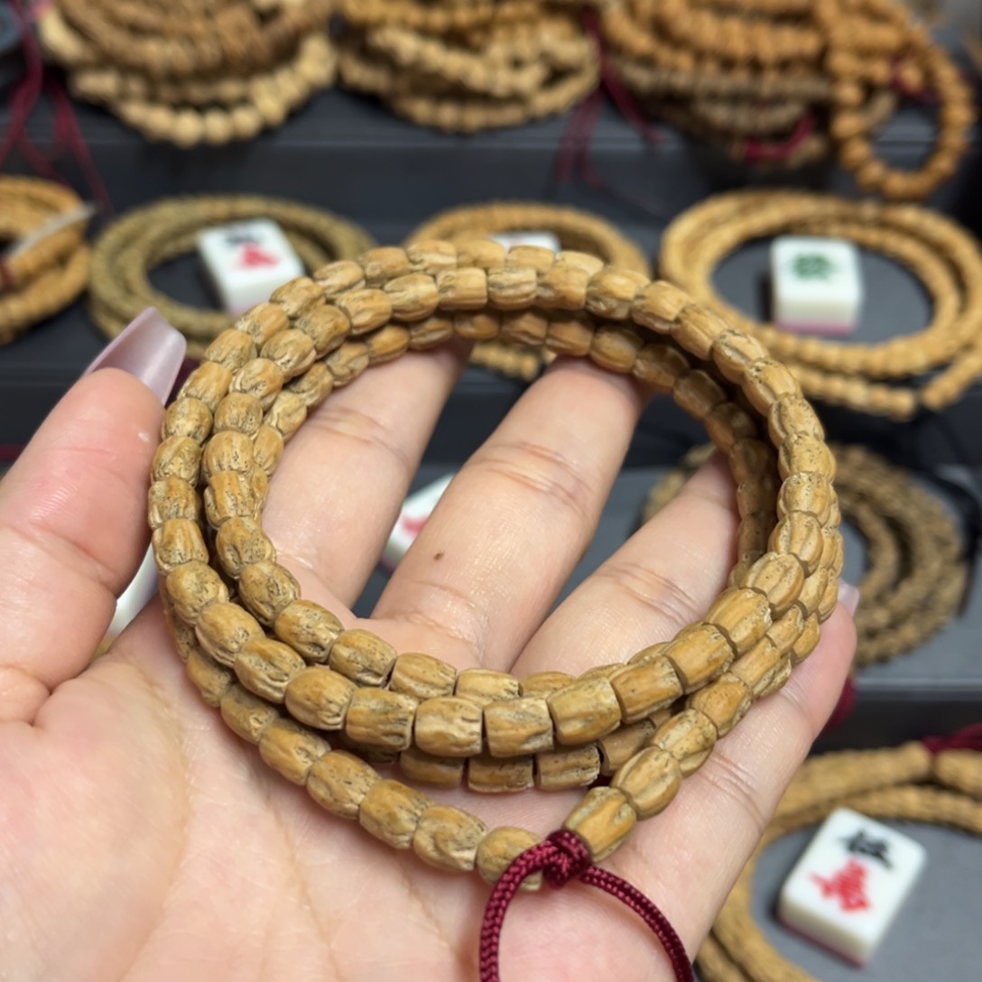 柏香籽/百香籽手串李**?