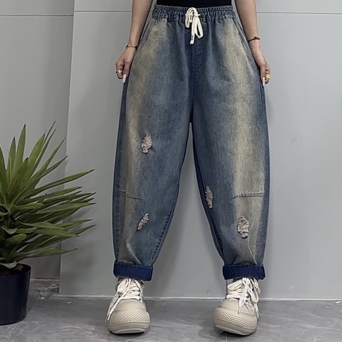 青禾-春季新款时尚百搭休闲破洞捏褶哈伦牛仔裤KP58335