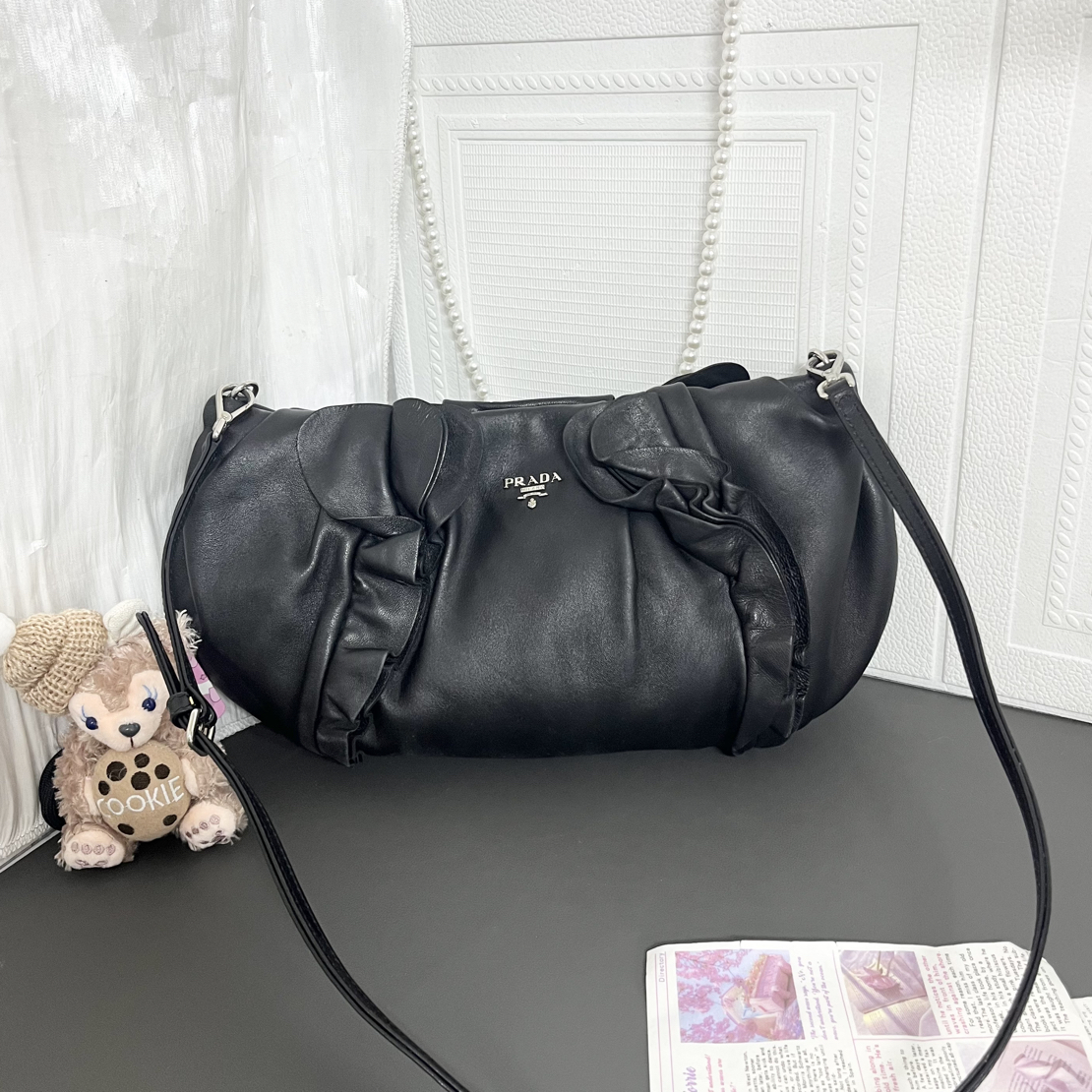95新 Prada/普拉达 95新月牙泡芙单肩包