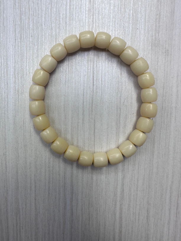 147号骆驼牙0.9桶珠手串