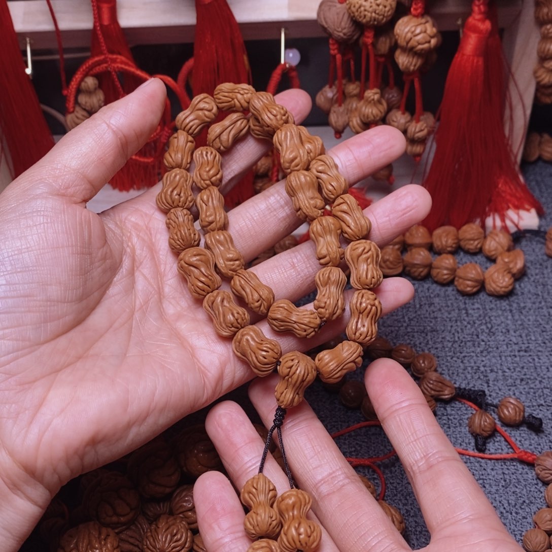 虫***动吊坠桃核桃枭手持