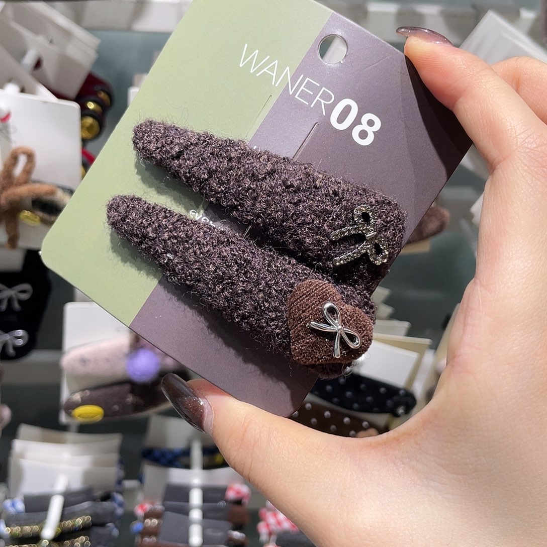 硅胶非金属咖色三角蝴蝶结