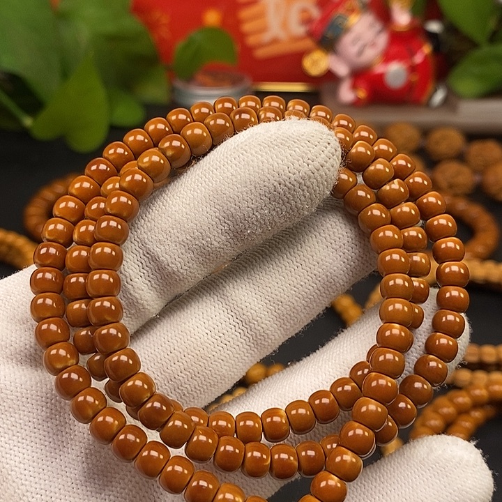 橄榄核手串6.0老挝核尖108漏白