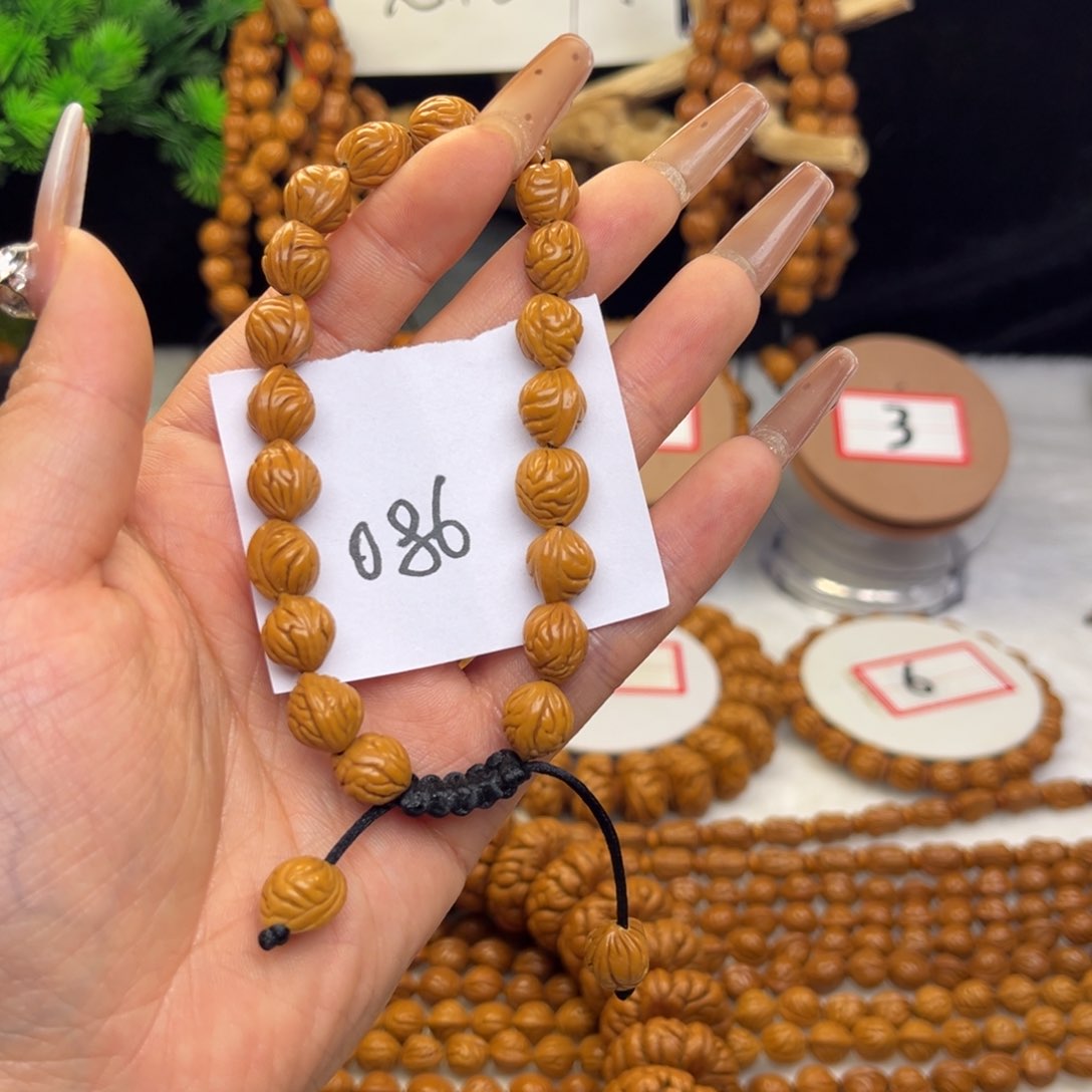 吊坠桃核江*.龙纹桃核小金豆手串