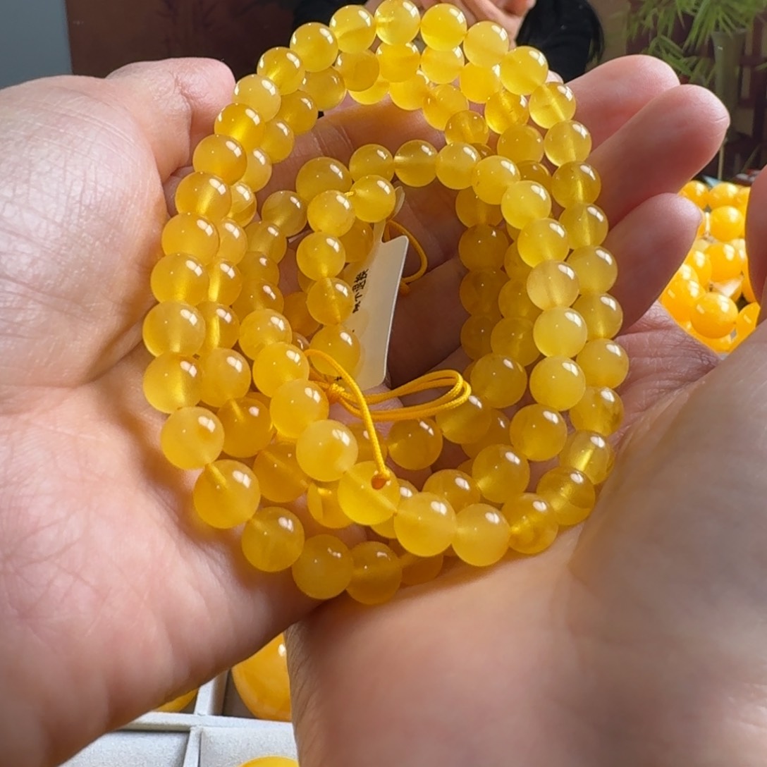 蜜蜡毛衣链未镶嵌不****?