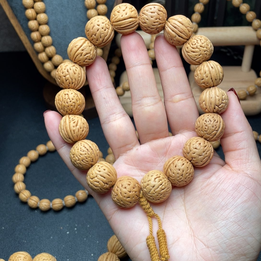 17野生灯笼滴流圆桃核手持