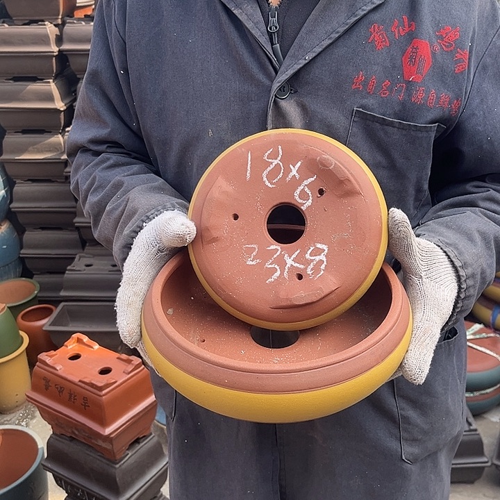 紫砂紫砂花盆和红陶茶具等等也