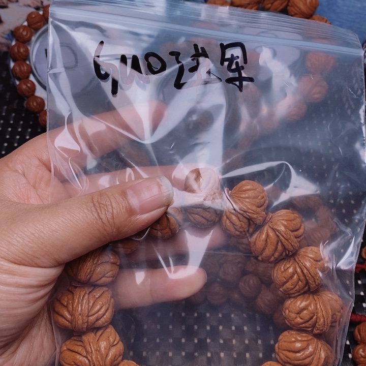 文玩核桃吊坠G****.桃核手串