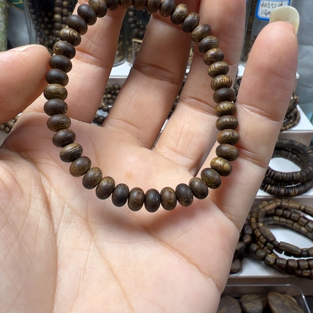 沉香碎屑沉香奇楠沉香卡6单圈算盘