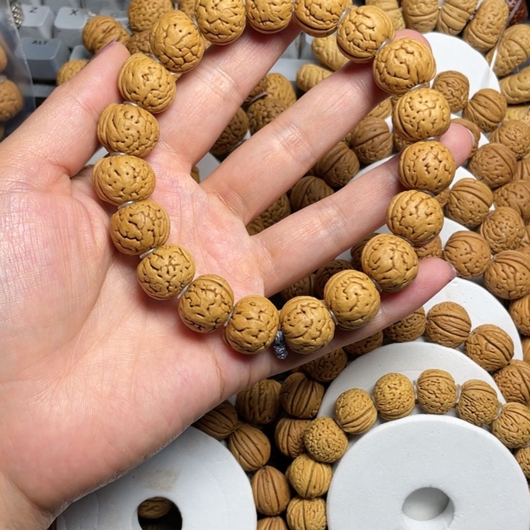 桃木伪**家桃核手串15+纽扣