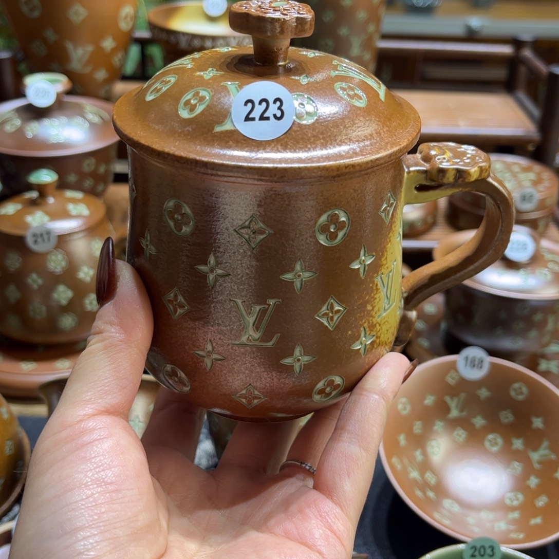 葫***…草木灰老花办公杯