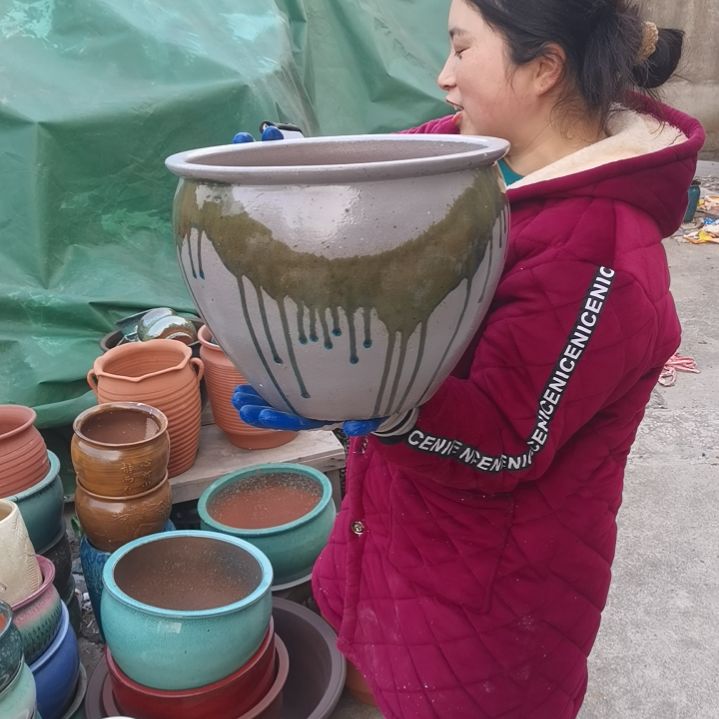 红陶口31高24瑕疵口裂