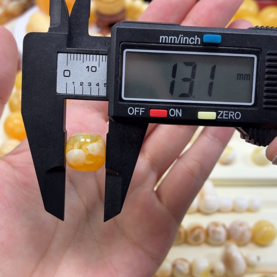 琥珀未镶嵌珠宝奇石焦皮金橘白溶洞荧光老型13mm