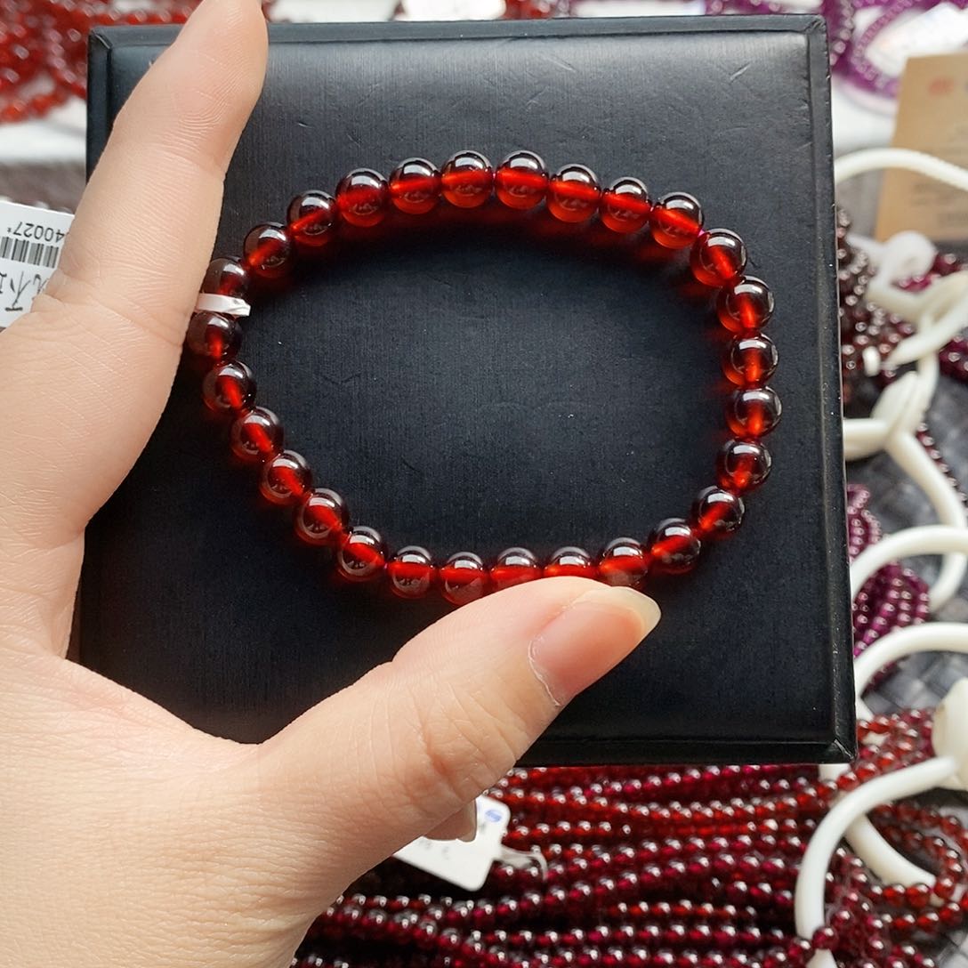 石榴石手链未镶嵌এ****听7mm橙红