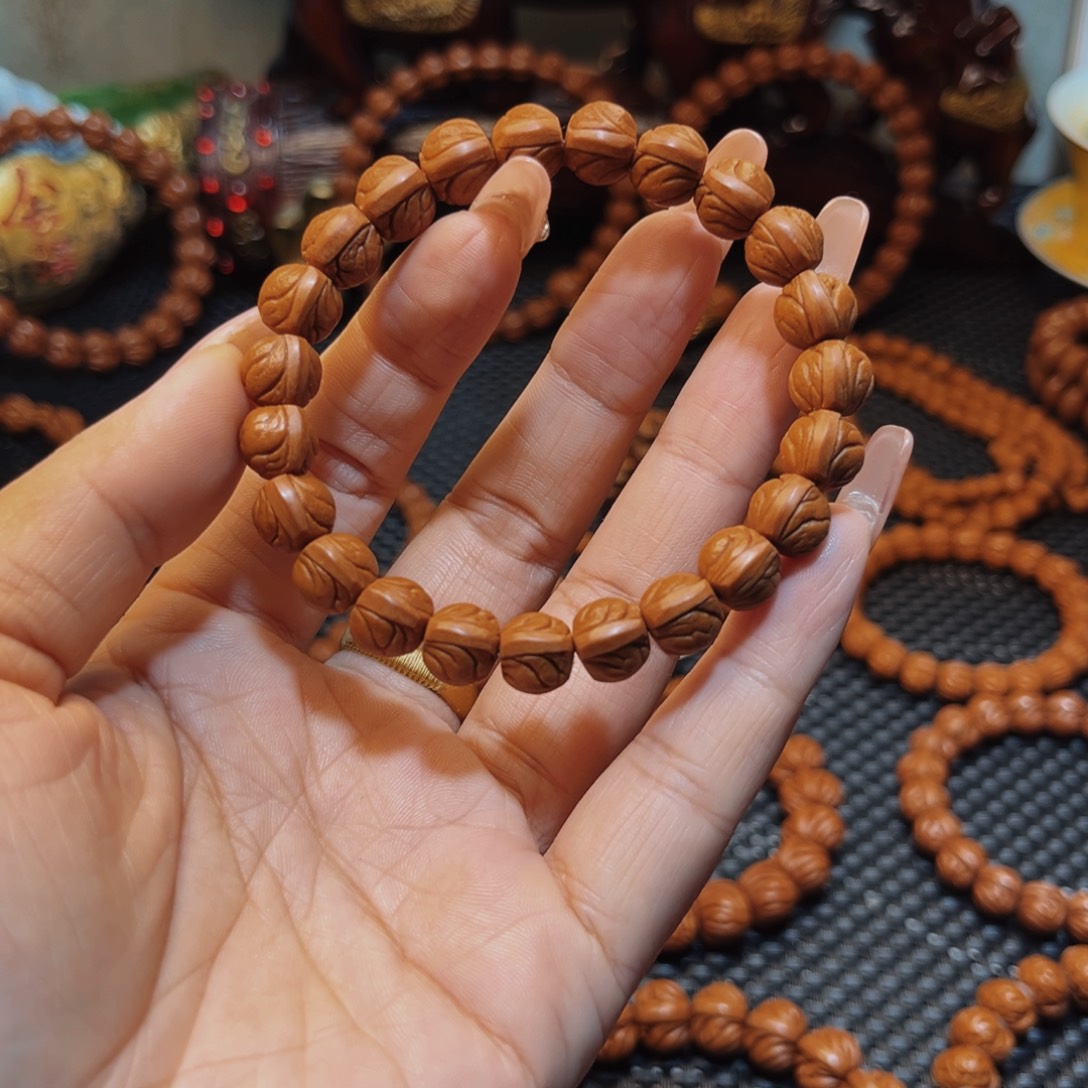 杨***亿桃核手串10老树树籽玉龙脊单圈