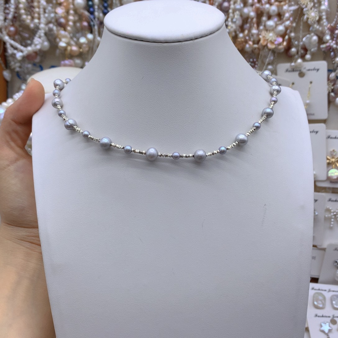 合金淡水珍珠耳饰M****塔