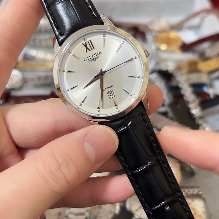 庭***)钢牛皮（革）钢石英机芯