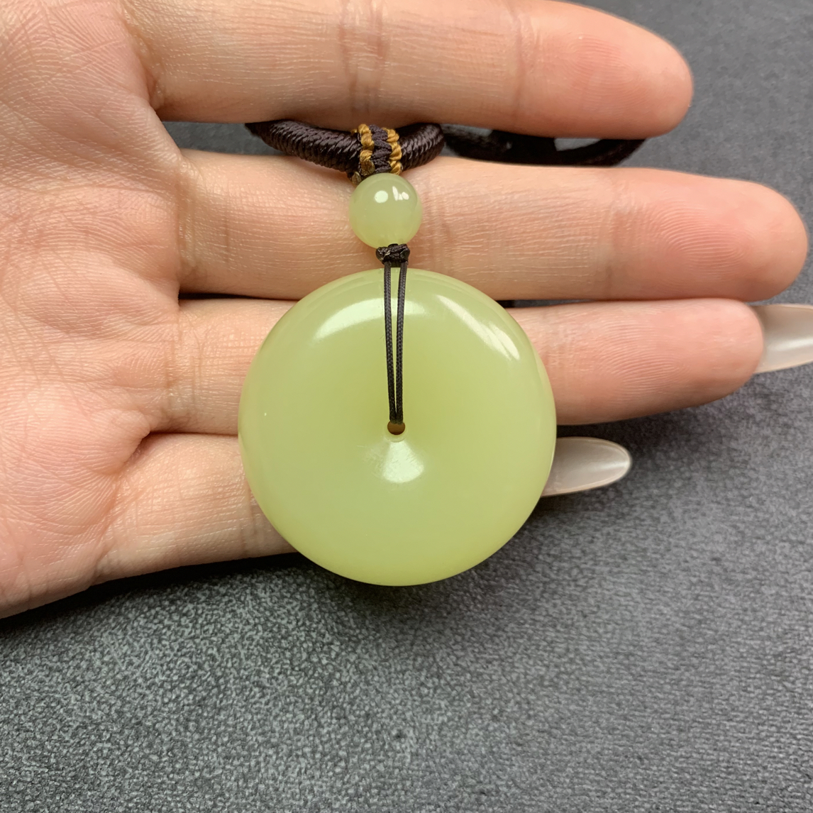 新疆和田玉若羌黄口平安扣 34.3x12.4 C90