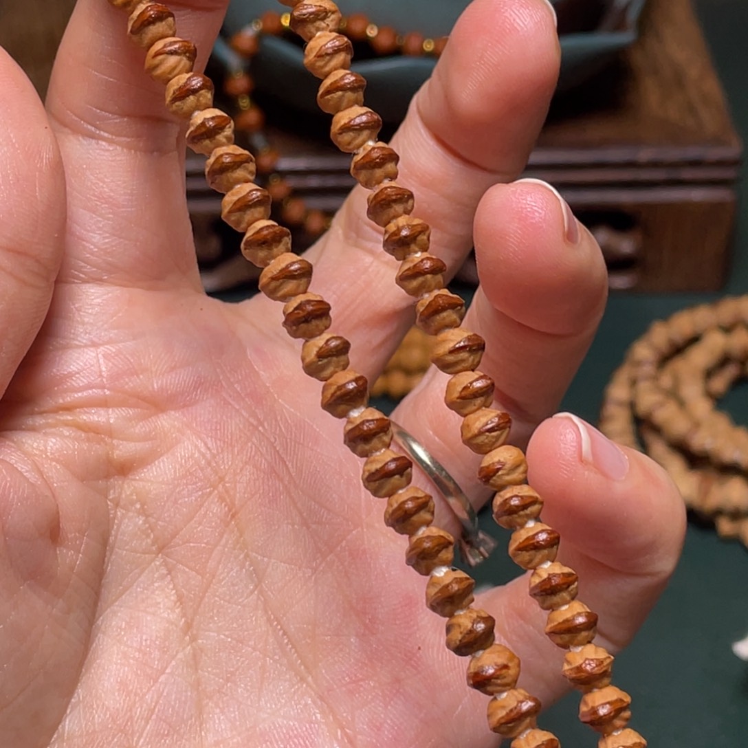 吊坠柏香籽/百香籽小凤眼手持