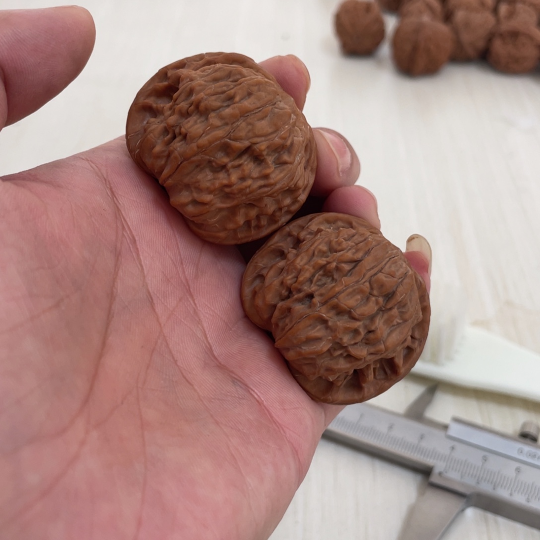 锦***安文玩核桃把件磨盘