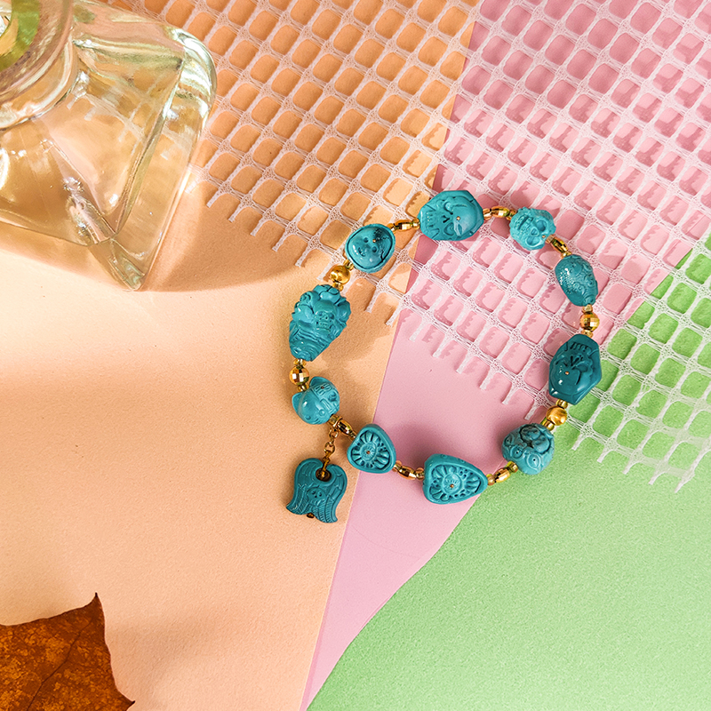 【】天然原矿绿松石18K金搭雾霾蓝骷髅多宝单圈-SJ1264