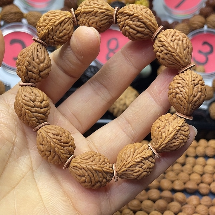 儒***聚桃核手串桃枭手串