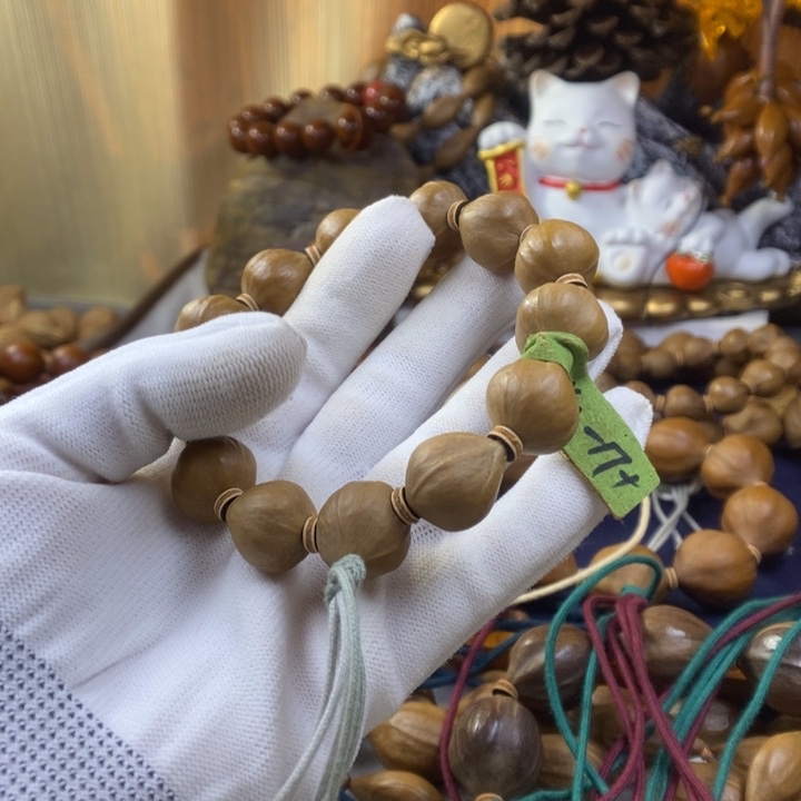 扬***橄榄核手串/手链1.6-17三花
